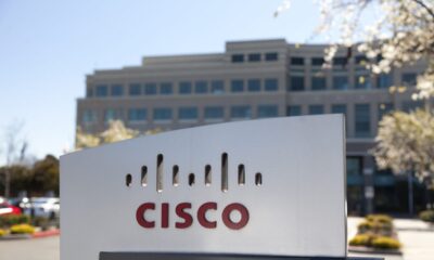 "San Jose, United States - February 11, 2013: A large Cisco Systems sign sits outside their headquarters located at 400 Tasman Dr. in San Jose California. Cisco Systems is a multinational company that produces computer networking equipment."