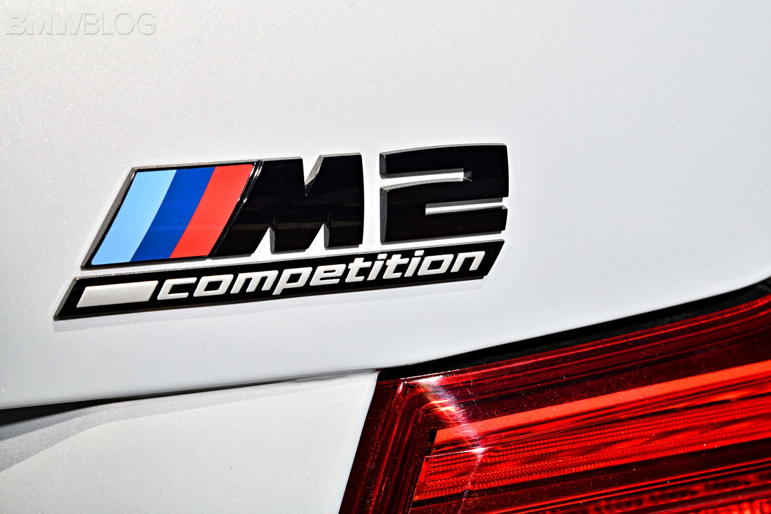 The BMW M2 Competition badge on the boot