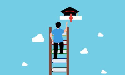 Person on a ladder reaching for a graduate hat as the adoption of generative AI has outpaced workforce capability, prompting OpenAI to target the skills gap with new certification standards.