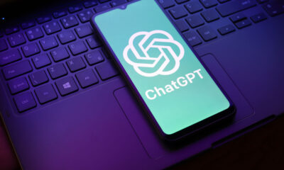 The ChatGPT logo appears on a smartphone screen