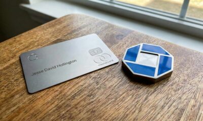A physical titanium Apple Card on a wooden table next to a Chase bank logo.