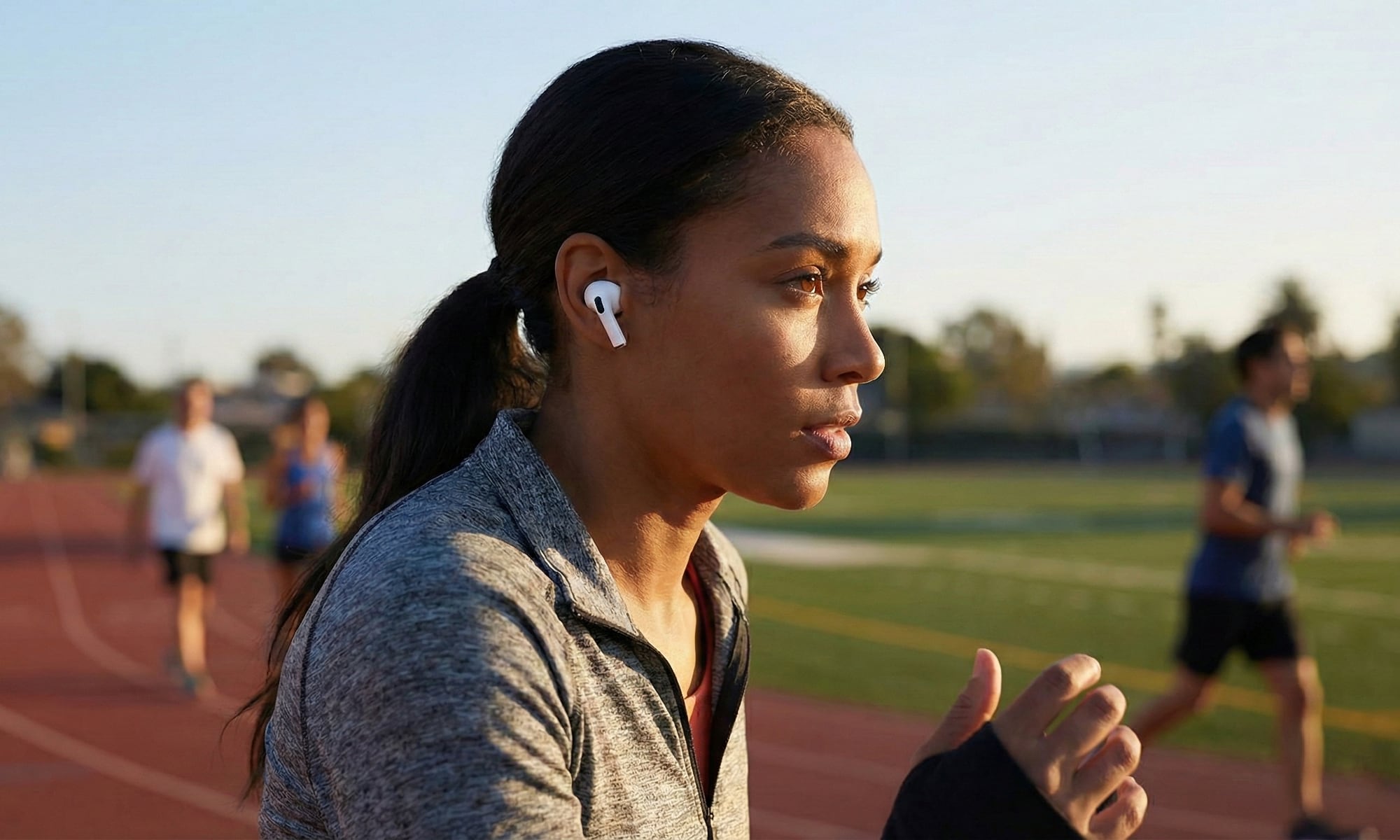 woman running with AirPods Pro 3
