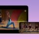 Apple Fitness+ displayed on iPad and iPhone, with a workout displayed on Apple Watch.