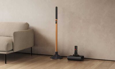 Dyson PencilWash standing against a wall
