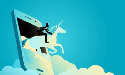 Man riding a unicorn out of a smartphone screen