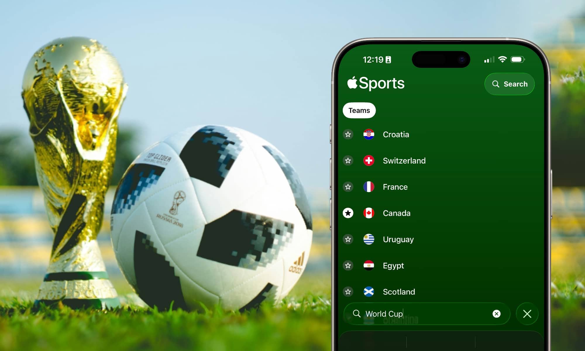 iPhone Showing Apple Sports app with FIFA 2026 World Cup Countries against a FIFA trophy and ball sitting on a field.