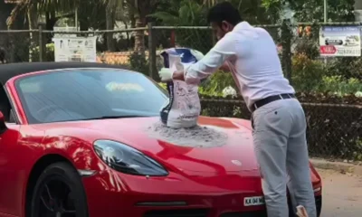 Porsche Boxster owner mixes concrete on his sports car's hood!