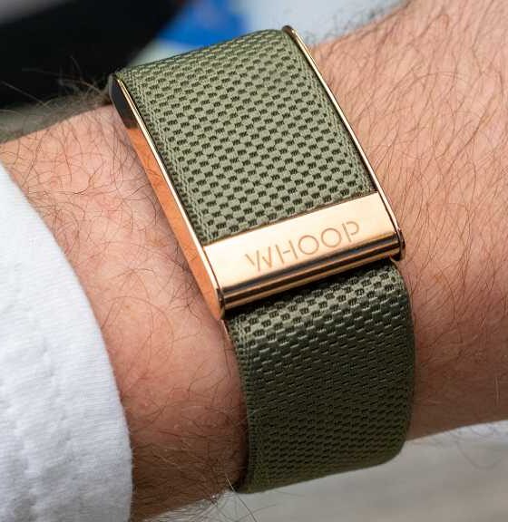 A Whoop 4.0 band on a left wrist
