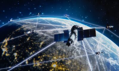 Many Satellites Flying over Earth as Seen from the Space, They Connect and Cover Planet with Digitalization Network of Information. Global Data Grid Connecting Whole World. 3D VFX Rendering