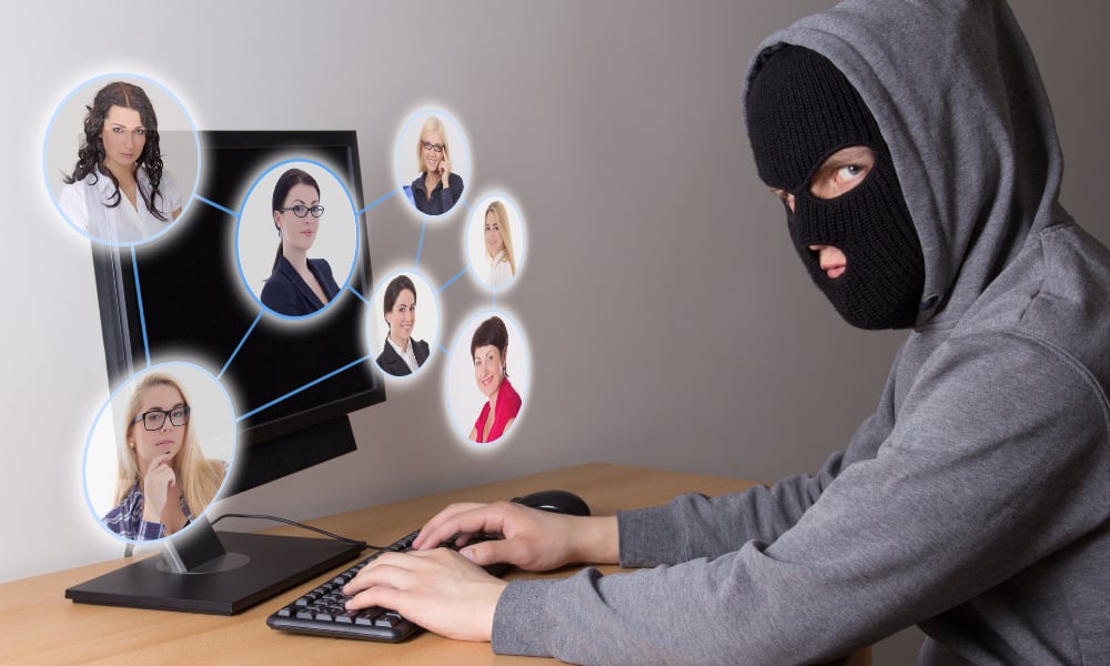 masked hacker scamming friends and family