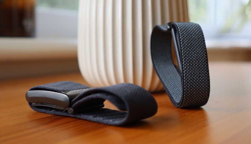 Fitbit Air next to Whoop Strap 4.0