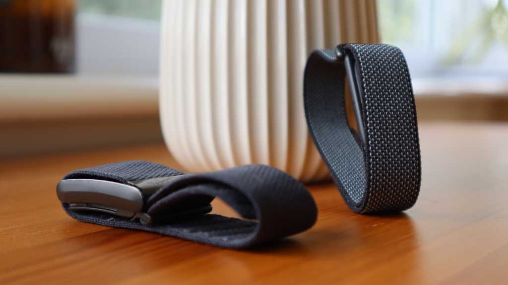 Fitbit Air next to Whoop Strap 4.0