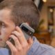 A man using the Google Pixel 8 smartphone