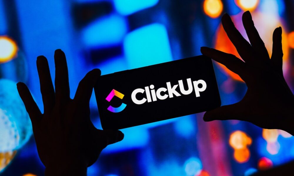 ClickUp logo on a smartphone