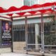 Bus stop shelter with red canopy and ad for Artisan AI reading "Stop Hiring Humans" and "For Work They Hate" on city sidewalk, San Francisco, California, September 30, 2025. (Photo by Smith Collection/Gado/Getty Images)
