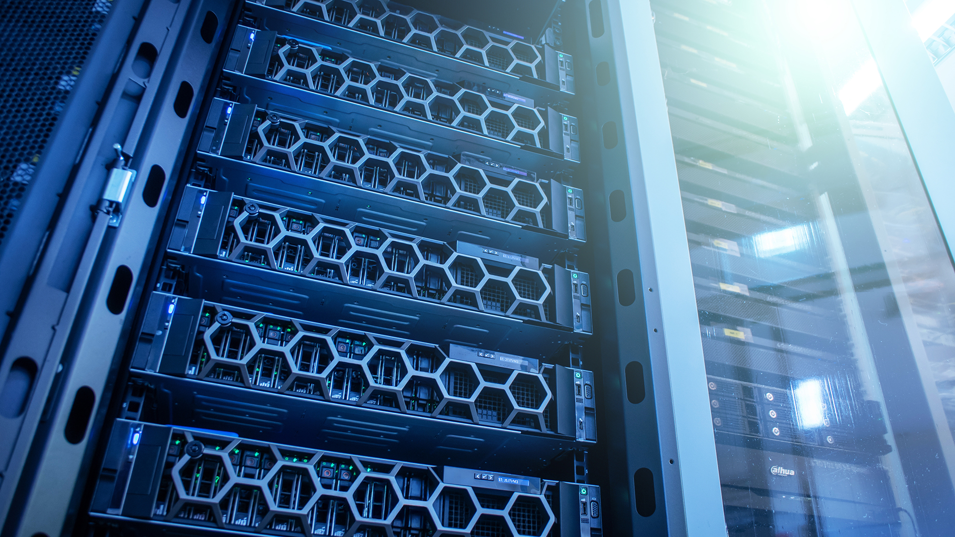 A close-up view of high-performance servers housed in a modern data center, showcasing advanced technology and efficient server management in an organized environment. HPC