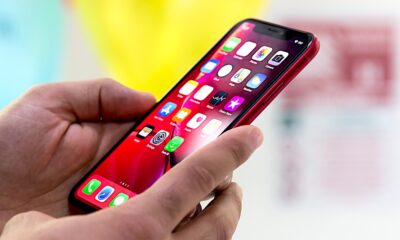 Holding Using Iphone Xr Red In Hands