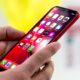 Holding Using Iphone Xr Red In Hands