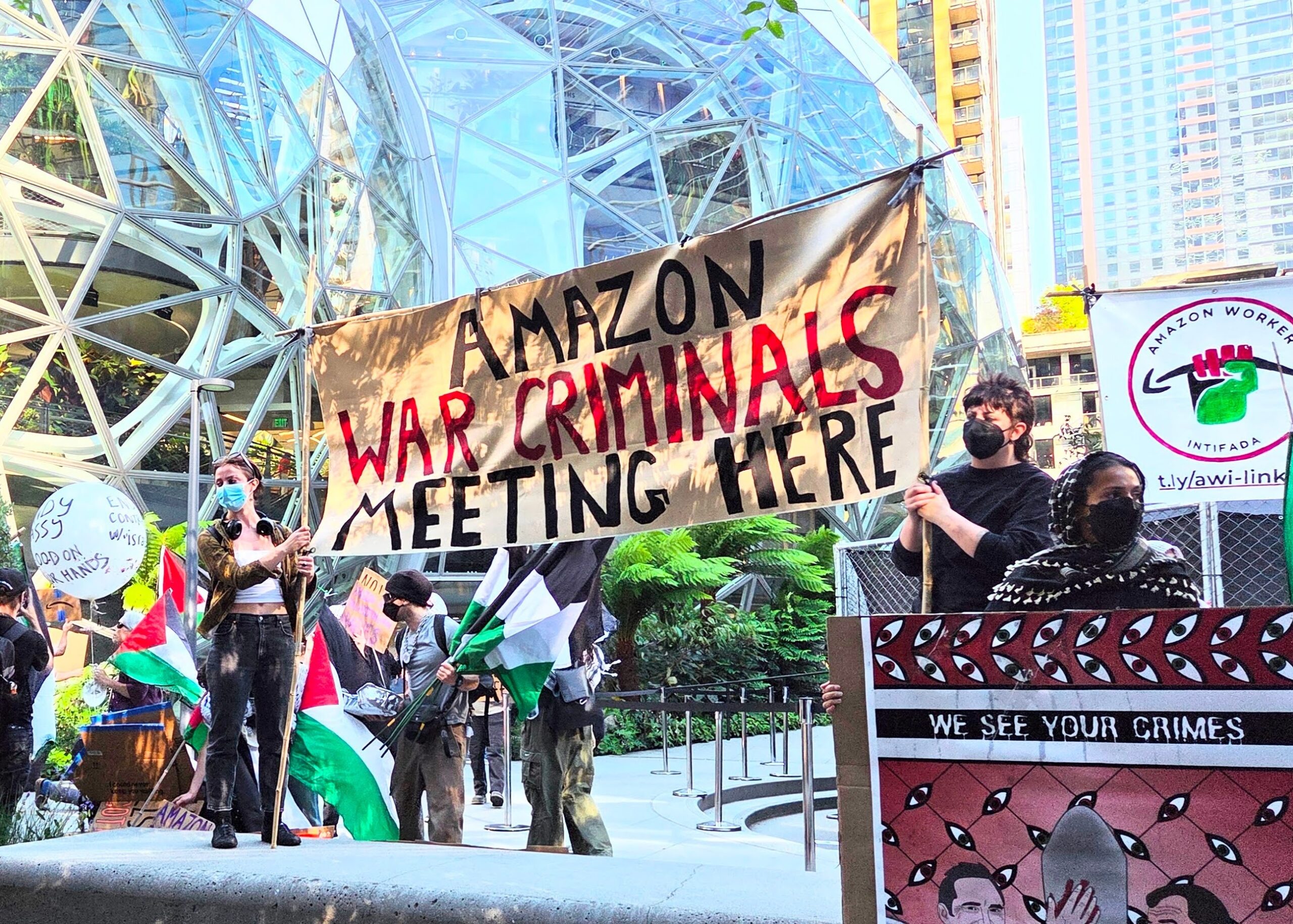 Worlds collide at Amazon Spheres as pro-Palestinian group protests cloud giant's Israel contracts – GeekWire