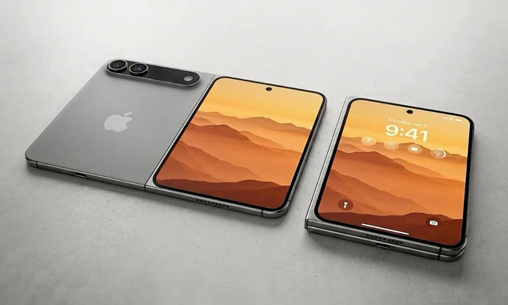 Concept image of a passport-style "iPhone Fold" laying flat on a gray table.