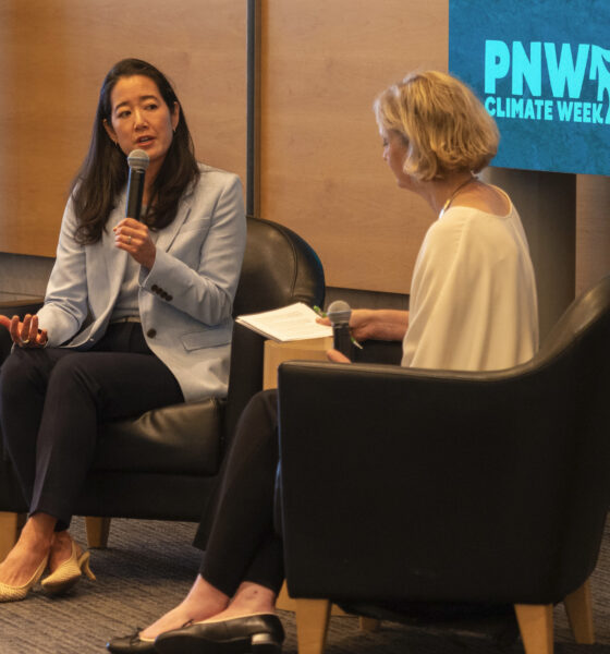 Protesters confront Microsoft CSO over carbon goals and AI, disrupting climate event – GeekWire