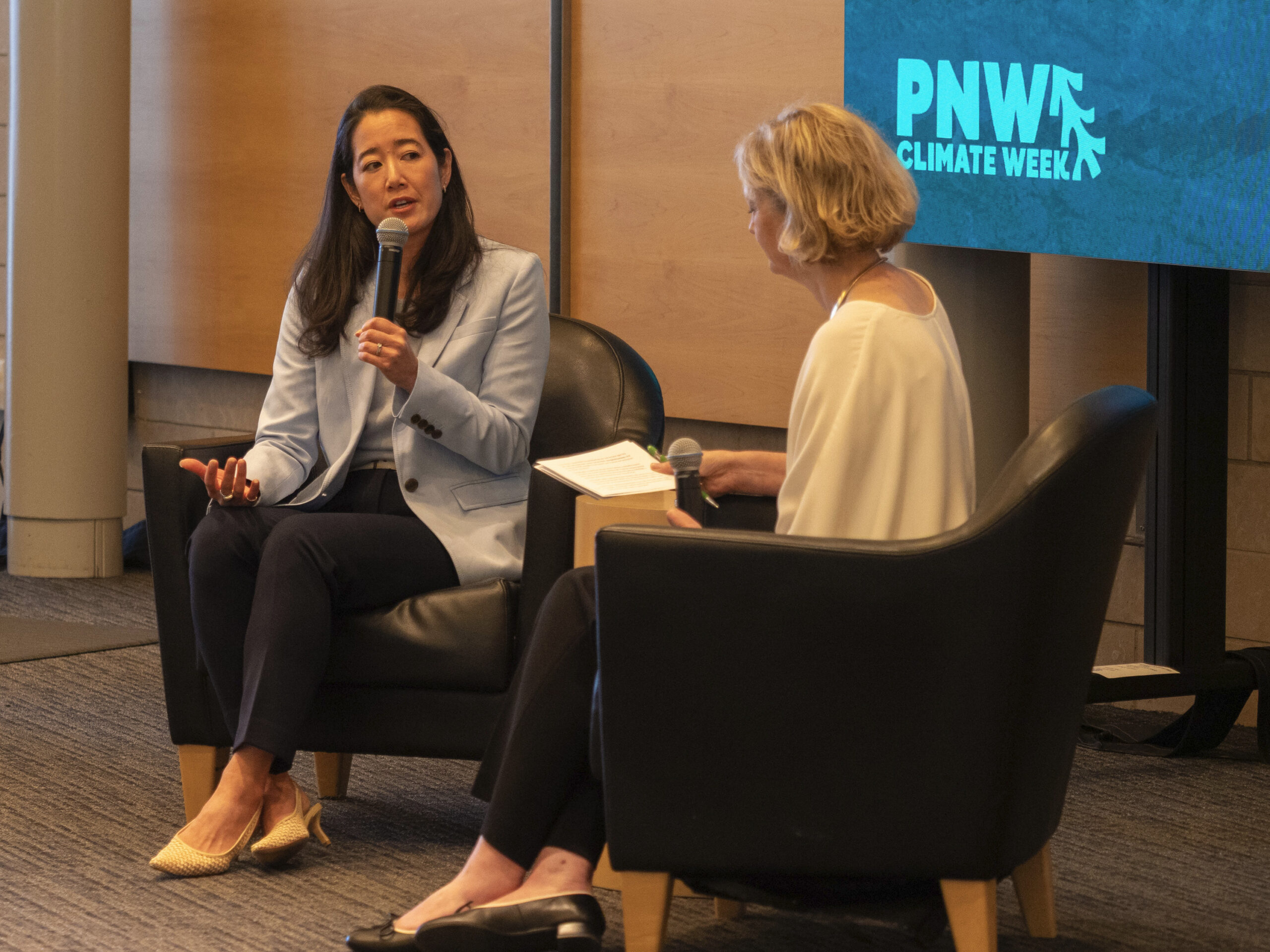 Protesters confront Microsoft CSO over carbon goals and AI, disrupting climate event – GeekWire