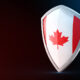 Canada is leveraging its abundant resources and innovation in advanced materials to address emerging threats and geopolitical challenges Protection shield and safeguard concept. Shiny steel armor painted as Canada national flag. Safety badge. Security label and Defense sign. Force and strong symbol. 3D rendering