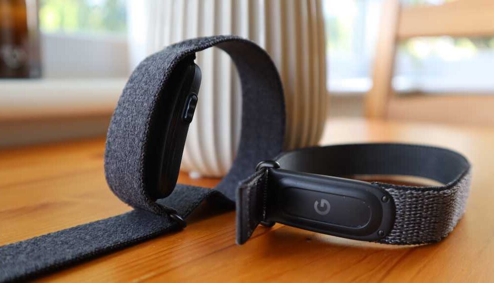 The Garmin Cirqa placed next to the Fitbit Air