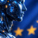 Futuristic humanoid AI figure made of glowing circuit boards and digital technology, shown in side profile against a blurred European Union flag background with golden stars. Advanced artificial intelligence concept, blue cybernetic body with illuminated microchips and data patterns, cinematic lighting, shallow depth of field, ultra-realistic style, high-tech atmosphere, futuristic European AI regulation and digital innovation theme, photorealistic details, dark blue color palette, sharp focus, 8K.