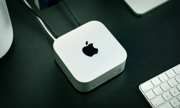 Mac mini M4 black desk keyboard