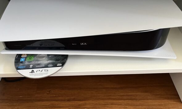 Inserting disc into PlayStation 5