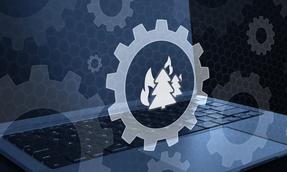 A 3D conceptual illustration showing a laptop computer combined with an overlay of a mechanical gear icon containing a burning tree symbol, representing environmental technology settings, climate data processing, or wildfire monitoring software.