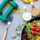 healthy food and hand weights
