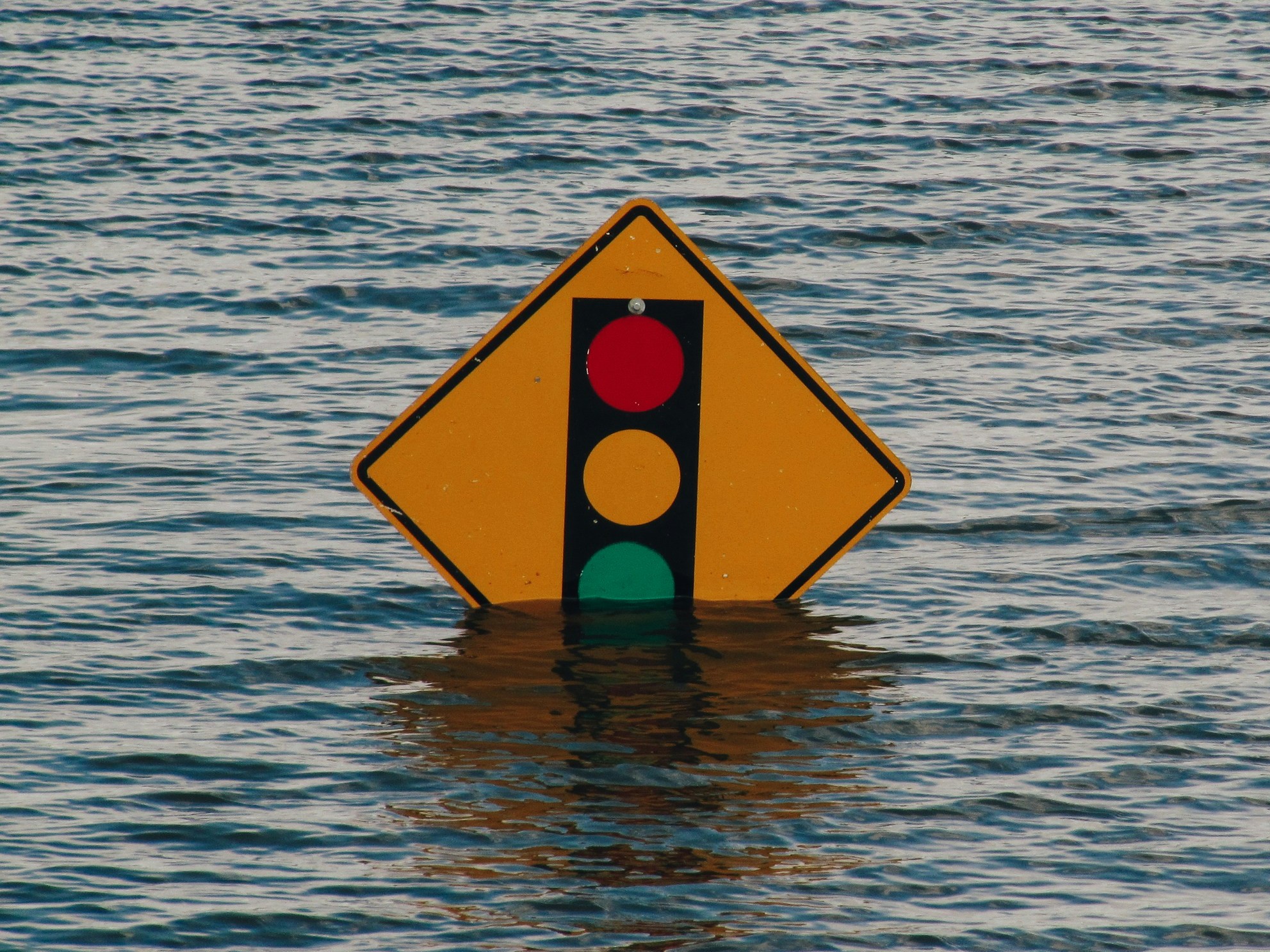 Sign in a flood as MIT engineers have built an AI tool that forecasts extreme weather without training on historical disaster data.