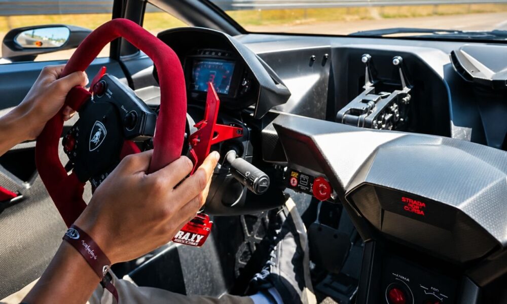 Riding shotgun in a Lamborghini Sesto Elemento at Laguna Seca