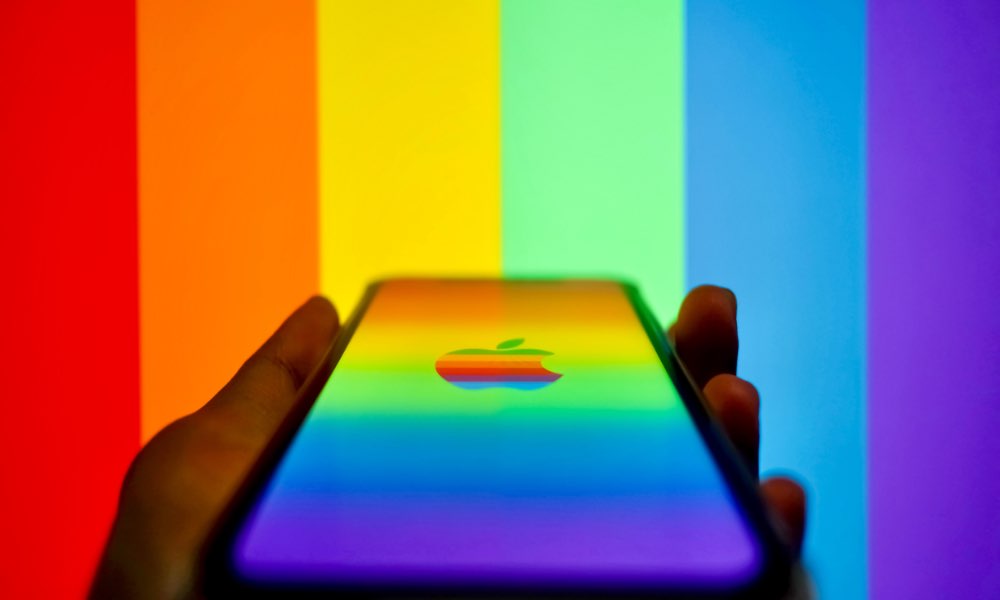 iPhone with rainbow Apple logo against test pattern