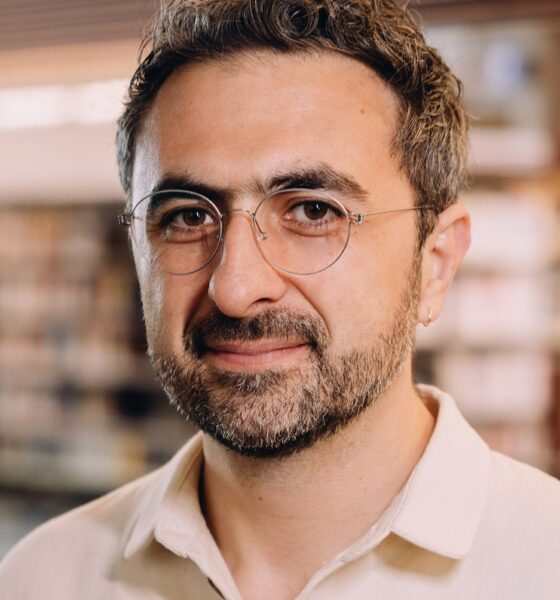 Photo of Microsoft AI CEO Mustafa Suleyman as he warns that Anthropic risks AI alignment failures by training Claude to view itself as a conscious entity deserving of legal rights.