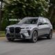 2027 BMW X7 G67 rendering with split headlights and redesigned kidney grilles