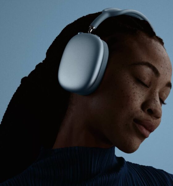 A woman wearing the AirPods Max 2.