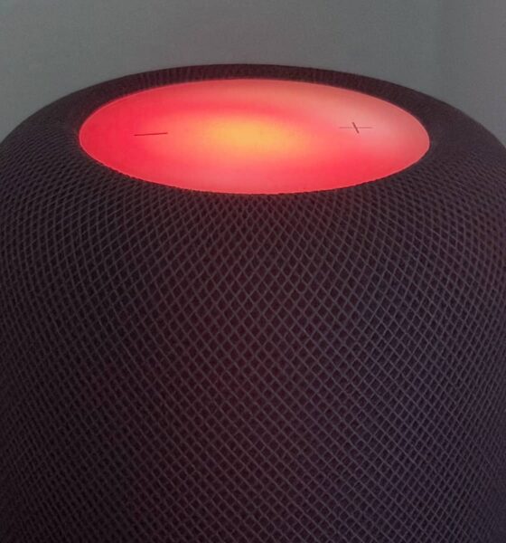 A HomePod (2nd generation) with a red Sound Glow